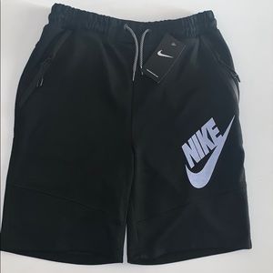 Nike shorts with zipper pockets.